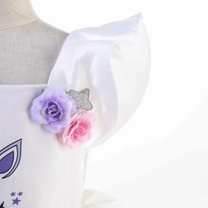 White unicorn princess dress with satin ruffles and colorful floral shoulder details