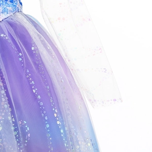 Detailed close-up of girls purple and blue gradient tulle dress with sparkling sequins