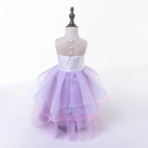 Detail of multi-layered purple tulle skirt and white satin bodice on unicorn princess gown