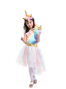 Close-up of girls rainbow unicorn tutu dress with golden belt and wing accessory details