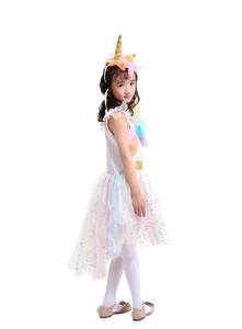 Detail view of colorful tulle tutu layers and sequins on the kids unicorn dress