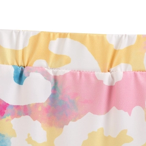 Detail shot of the elastic waistband on girls' tie-dye knit shorts with clean stitching