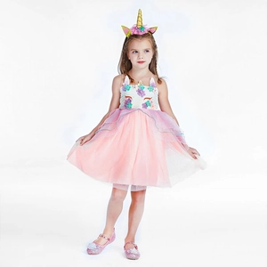 Detail of pink unicorn tutu dress for girls with 3D floral accents and golden headband