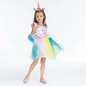 Detail of unicorn tutu dress with 3D velvet flowers and colorful rainbow tulle