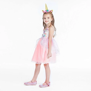 Detailed view of unicorn costume set with pink tutu dress, headband, and sequin shoes