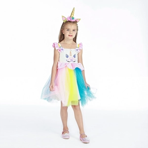 Detail of girls unicorn party dress with rainbow mesh skirt and gold headband set