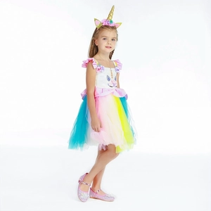 Detail of girls unicorn princess dress showing tulle skirt and flower bodice ornaments