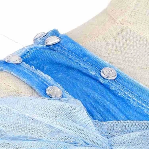 Close-up of blue velvet neckline with silver mesh and rhinestones for girls dress