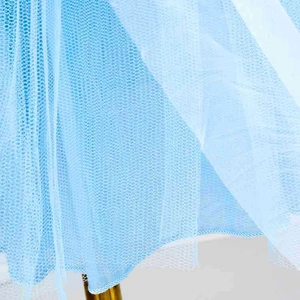 Detailed macro view of light blue layered mesh fabric with fine honeycomb texture