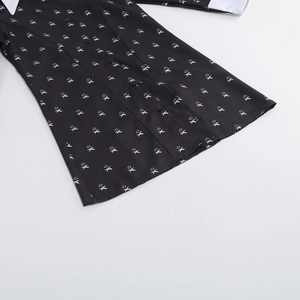 Wednesday Addams black long sleeve dress with white collar and all-over cross pattern