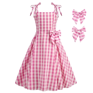 Pink and white gingham girls dress with shoulder bows and matching hair accessories