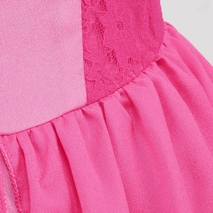 Detail of rose pink dress featuring intricate floral lace and pleated chiffon fabric