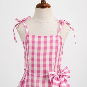 Pink gingham check dress for girls with bow straps and waist ribbon detail