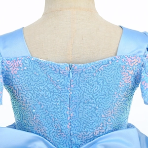 Close-up of blue Cinderella dress back with sequins, bow, and invisible zipper detail