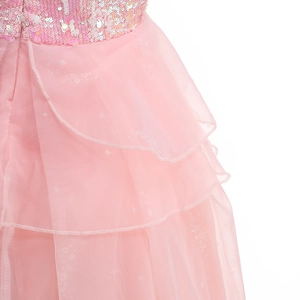 Detail of pink Glinda cosplay dress showing layered tulle skirt and sparkling sequins