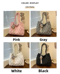 Quilted nylon shoulder bags in pink, gray, white and black with woven handles and cute charms