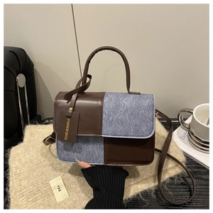 Retro color-block women's handbag with brown leather and blue textured crossbody strap