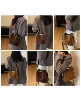 Detailed views of a dark brown suede bucket bag with stylish stitching and gold hardware