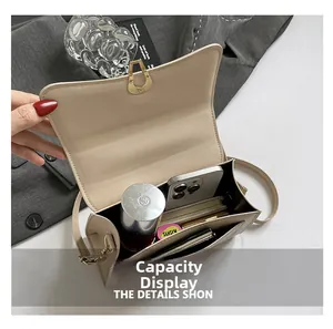 Top view of beige leather handbag interior showing large storage capacity for essentials