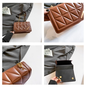 Detail of brown quilted leather texture and gold magnetic snap closure of a bag