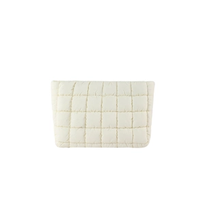 Minimalist white quilted clutch bag with square stitching and soft padded fabric texture