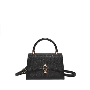 Elegant black sequined square handbag for women with golden horseshoe clasp and top handle