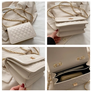 Detail view of beige quilted chain bag with gold twist lock and internal compartments