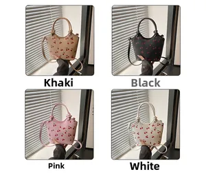 Collage of cherry print bucket bags in khaki, black, pink and white with adjustable straps