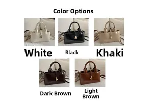 Multi-color collection of leather tote bags with gold ball clasps and top handles