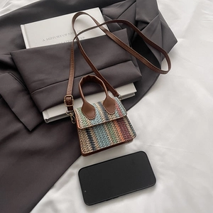Mini colorful woven crossbody straw bag with brown leather strap and gold hardware