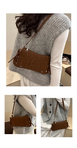 Detail view of leopard print shoulder bag with silver studs and side bow knot accents