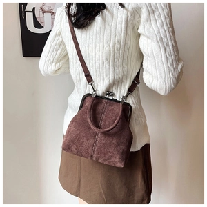 Brown frosted leather doctor bag with vintage metal clasp and adjustable shoulder strap