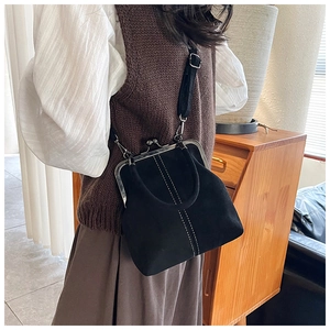 Retro black crossbody doctor bag with silver metal clasp and white contrast stitching