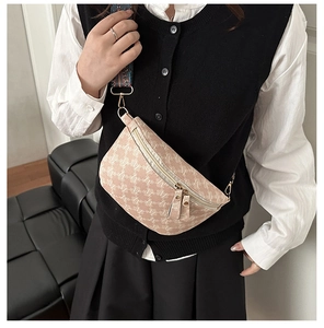 Detail of nude pink jacquard chest bag with retro woven wide shoulder strap