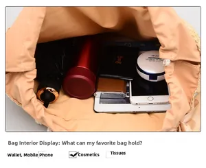 Interior view showing large capacity of woven straw bag with pink lining for daily essentials