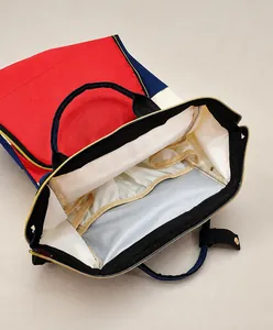 Detail view of large-opening oxford backpack interior with multi-compartment storage