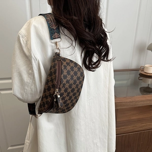 Vintage brown monogram chest bag with a wide geometric woven strap for women
