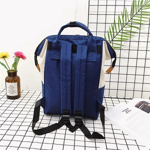 Rucksack aus Oxford-Gewebe in Blau und Beige mit breiten Trägern und Tragegriff