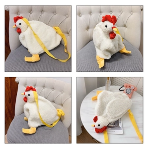 Detailed close-up of a plush hen crossbody bag showing white sherpa texture and red comb
