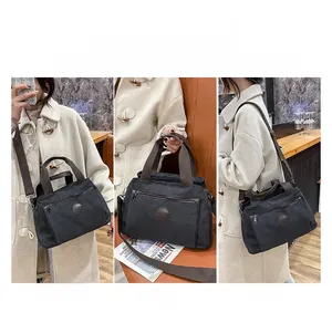 Detailed views of gray canvas travel bag showing crossbody, handheld, and shoulder carry modes