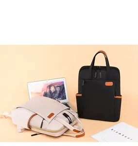 Detailed view of oxford fabric laptop backpack with leather trim and side pockets