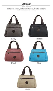 Detailed grid view showing five colors of canvas travel duffle bags with leather logo patches