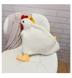 Detailed close-up of a cute plush chicken shoulder bag with soft white faux fur texture