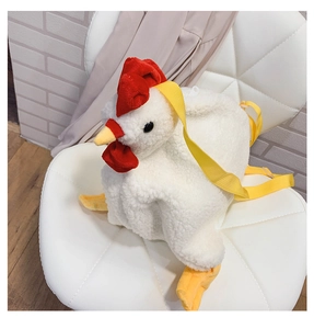 Detail view of plush chicken bag with white fleece texture and yellow woven strap