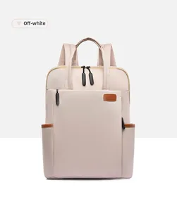 Detailed front view of off-white nylon backpack with leather accents and sturdy zippers