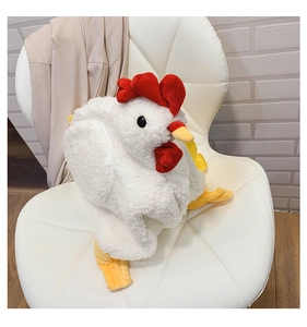 Detail of white fluffy chicken plush bag with red crest and soft lamb wool texture