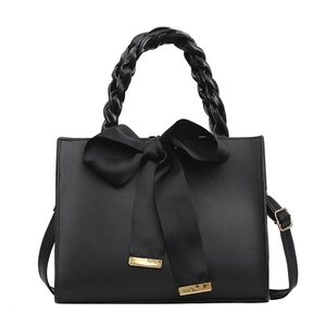 Sac à main élégant en simili cuir noir avec grand nœud en soie et poignée tressée
