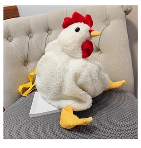 Close-up of cute white plush chicken crossbody bag with red comb and yellow adjustable strap