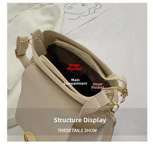 Detail showing the main compartment and interior slot pocket of this woven bucket bag