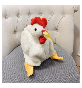 Detailed view of plush chicken bag featuring white lamb wool texture and yellow straps